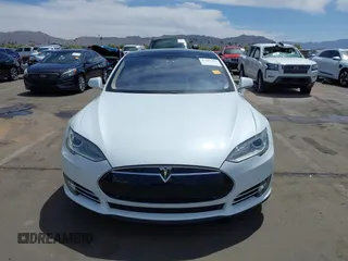 2014 Tesla Model S 60 z VIN 5YJSA1H13EFP33659, wystawiony jako IAAI lot #42101491 z przebiegiem 113 460 mil mil oraz . Historia ofert i sprzedaży dostępna na DreamBid. Obrazek 11.