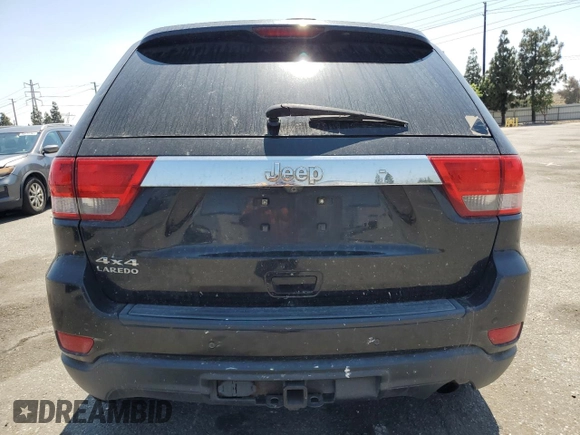 2011 Jeep Grand Cherokee Laredo with VIN 1J4RR4GG0BC563603, listed as a Copart auction lot 60237475 with 243,885 mi miles and Salvage title. Bid and sale history available at DreamBid. Image 6.