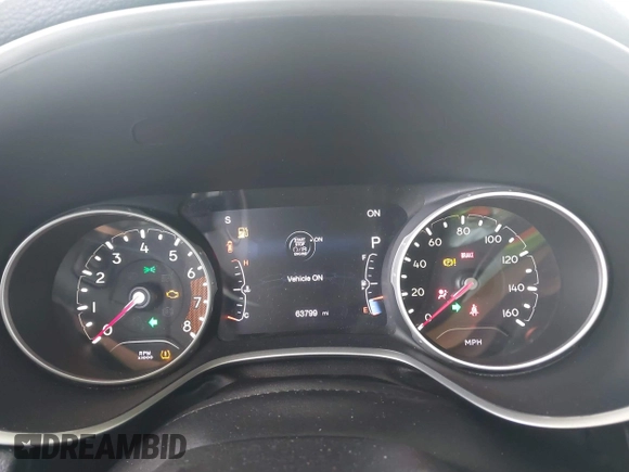 2020 Jeep Compass Latitude with VIN 3C4NJCBB8LT141375, listed as a IAAI auction lot 42382374 with 63,799 mi miles and . Bid and sale history available at DreamBid. Image 7.
