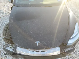 2023 Tesla Model Y Long Range z VIN 7SAYGDEE1PA078373, wystawiony jako Copart lot #48169175 z przebiegiem Nie podano mil oraz Szkoda całkowita • Salvage title. Historia ofert i sprzedaży dostępna na DreamBid. Obrazek 13.