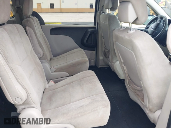 2012 Dodge Grand Caravan SXT with VIN 2C4RDGCG3CR308173, listed as a IAAI auction lot 42255879 with 96,489 mi miles and . Bid and sale history available at DreamBid. Image 8.