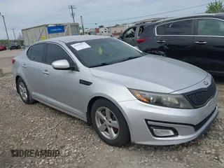 2014 Kia Optima LX z VIN 5XXGM4A75EG303366, wystawiony jako IAAI lot #42351573 z przebiegiem 207 688 mil mil oraz . Historia ofert i sprzedaży dostępna na DreamBid. Obrazek 1.