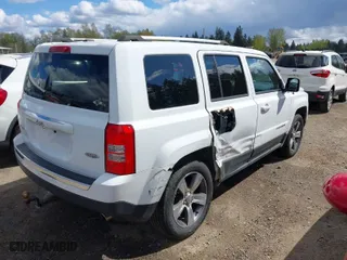 2016 Jeep Patriot High Altitude Edition with VIN 1C4NJRFB0GD673910, listed as a IAAI auction lot 39201864 with 138,952 mi miles. Bid and sale history available at carsss.com. Image 4.