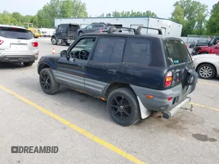 1999 Toyota RAV4 with VIN JT3HP10V2X7120498, listed as a IAAI auction lot 42409235 with 215,769 mi miles and . Bid and sale history available at DreamBid. Image 3.
