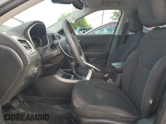 2018 Jeep Compass Sport with VIN 3C4NJCAB5JT272312, listed as a Copart auction lot 56700395 with 131,693 mi miles and Salvage title. Bid and sale history available at DreamBid. Image 7.