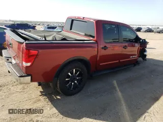 2015 Nissan Titan SL with VIN 1N6BA0EC5FN510345, listed as a Copart auction lot 73643204 with 112,685 mi miles and Salvage Title. Bid and sale history available at carsss.com. Image 3.