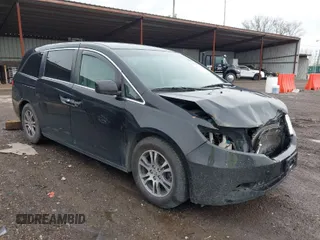 2012 Honda Odyssey EX with VIN 5FNRL5H46CB096547, listed as a IAAI auction lot 41919700 with 165,882 mi miles and . Bid and sale history available at carsss.com. Image 1.