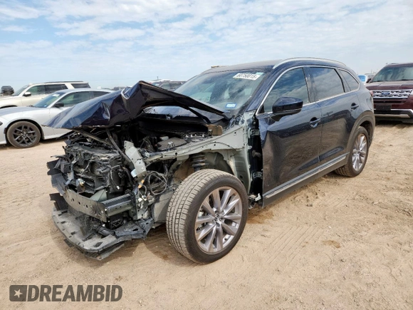 2023 Mazda CX-9 Carbon Edition with VIN JM3TCBDY1P0633964, listed as a Copart auction lot 60750015 with 34,657 mi miles and Salvage title. Bid and sale history available at DreamBid. Image 1.