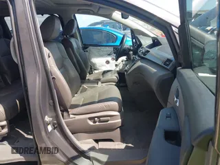 2014 Honda Odyssey Touring with VIN 5FNRL5H99EB075979, listed as a IAAI auction lot 42520154 with 99,314 mi miles and . Bid and sale history available at DreamBid. Image 5.