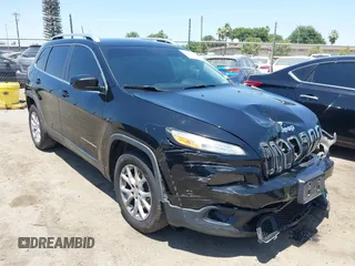 2018 Jeep Cherokee Latitude with VIN 1C4PJLCB5JD503737, listed as a IAAI auction lot 42593770 with 112,697 mi miles and . Bid and sale history available at DreamBid. Image 1.