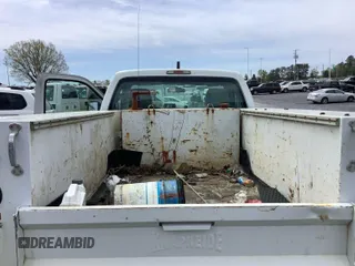 2014 Ford Super Duty F-250 SRW XL with VIN 1FDBF2B68EEB13382, listed as a IAAI auction lot 42132436 with 140,912 mi miles. Bid and sale history available at carsss.com. Image 1.