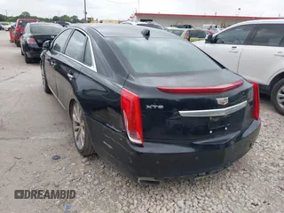 2017 Cadillac XTS Luxury z VIN 2G61M5S32H9158776, wystawiony jako IAAI lot #42528442 z przebiegiem 90 680 mil mil oraz . Historia ofert i sprzedaży dostępna na DreamBid. Obrazek 3.