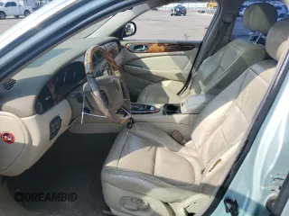 2004 Jaguar XJ with VIN SAJWA71C94SG24466, listed as a Copart auction lot 46610995 with 173,570 mi miles and Salvage Title. Bid and sale history available at carsss.com. Image 7.