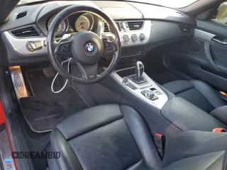 2011 BMW Z4 sDrive35is with VIN WBALM1C54BE393857, listed as a Copart auction lot 72769234 with 88,986 mi miles and Salvage Title. Bid and sale history available at carsss.com. Image 8.