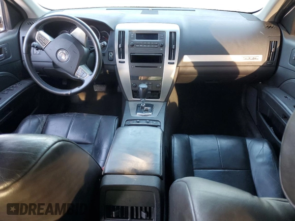 2009 Cadillac STS RWD z VIN 1G6DW67V390104597, wystawiony jako Copart lot #73794724 z przebiegiem Nie podano mil oraz Szkoda całkowita • Salvage title. Historia ofert i sprzedaży dostępna na DreamBid. Obrazek 8.