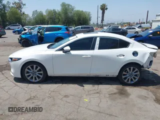 2023 Mazda 3 S Carbon Edition with VIN 3MZBPACM1PM356552, listed as a IAAI auction lot 42603574 with 20,092 mi miles and . Bid and sale history available at DreamBid. Image 15.