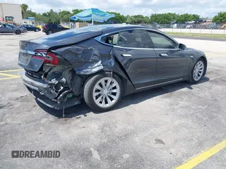 2016 Tesla Model S 70 with VIN 5YJSA1E16GF156312, listed as a IAAI auction lot 42469451 with 90,317 mi miles and . Bid and sale history available at DreamBid. Image 4.