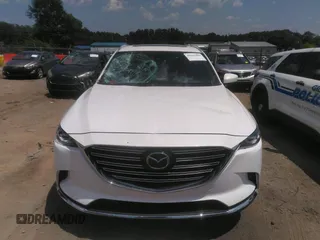 2017 Mazda CX-9 Signature with VIN JM3TCBEY2H0140598, listed as a IAAI auction lot 42561999 with 61,574 mi miles and . Bid and sale history available at DreamBid. Image 12.