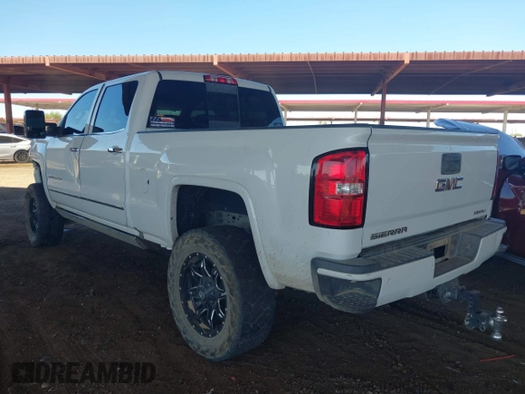 2016 GMC Sierra 2500HD Denali z VIN 1GT12UE85GF157972, wystawiony jako IAAI lot #40659216 z przebiegiem 130 351 mil mil oraz . Historia ofert i sprzedaży dostępna na DreamBid. Obrazek 3.
