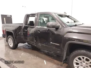 2015 GMC Sierra 1500 SLE with VIN 1GTV2UEC0FZ151760, listed as a IAAI auction lot 41988450 with 124,674 mi miles. Bid and sale history available at carsss.com. Image 6.