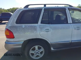 2003 Hyundai Santa Fe GLS z VIN KM8SC13D33U463702, wystawiony jako IAAI lot #42302300 z przebiegiem 226 340 mil mil oraz . Historia ofert i sprzedaży dostępna na DreamBid. Obrazek 6.