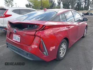 2017 Toyota Prius Plus with VIN JTDKARFP5H3061952, listed as a IAAI auction lot 42217235 with 148,343 mi miles and . Bid and sale history available at DreamBid. Image 4.