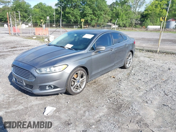 2014 Ford Fusion Titanium with VIN 3FA6P0K98ER197482, listed as a IAAI auction lot 42251293 with 165,520 mi miles and . Bid and sale history available at DreamBid. Image 2.