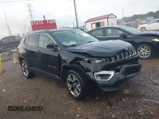 2018 Jeep Compass Limited with VIN 3C4NJDCB1JT354234, listed as a IAAI auction lot 39985028 with 76,293 mi miles. Bid and sale history available at carsss.com. Image 1.