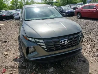 2023 Hyundai Tucson SEL z VIN 5NMJBCAE1PH272772, wystawiony jako Copart lot #56799805 z przebiegiem 20 041 mil mil oraz Szkoda całkowita • Salvage title. Historia ofert i sprzedaży dostępna na DreamBid. Obrazek 13.