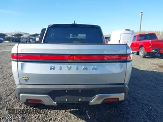 2023 Rivian R1T Adventure with VIN 7FCTGAAA0PN021864, listed as a IAAI auction lot 41620630 with 1 mi miles. Bid and sale history available at carsss.com. Image 16.