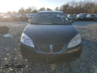 2009 Pontiac G6 1SA z VIN 1G2ZG57B794157106, wystawiony jako Copart lot #87292644 z przebiegiem Nie podano mil oraz Szkody całkowita. Historia ofert i sprzedaży dostępna na DreamBid. Obrazek 5.