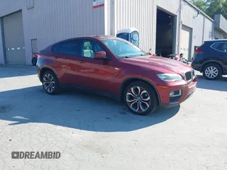 2014 BMW X6 xDrive35i z VIN 5UXFG2C57E0C44052, wystawiony jako IAAI lot #40231766 z przebiegiem 131 573 mil mil oraz . Historia ofert i sprzedaży dostępna na DreamBid. Obrazek 1.