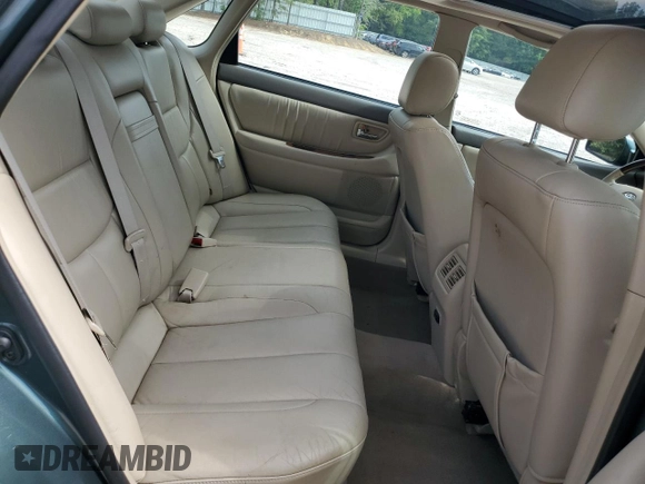 2003 Toyota Avalon XL z VIN 4T1BF28B43U322481, wystawiony jako Copart lot #51876905 z przebiegiem 135 237 mil mil oraz Szkoda całkowita • Salvage title. Historia ofert i sprzedaży dostępna na DreamBid. Obrazek 10.