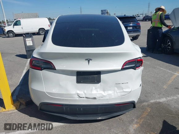 2020 Tesla Model Y Long Range with VIN 5YJYGDEE2LF044811, listed as a IAAI auction lot 41839136 with 68,445 mi miles and . Bid and sale history available at DreamBid. Image 16.