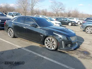 2016 Cadillac CTS-V z VIN 1G6A15S69G0148435, wystawiony jako IAAI lot #41306543 z przebiegiem 22 045 mil mil oraz . Historia ofert i sprzedaży dostępna na DreamBid. Obrazek 1.