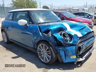 2023 MINI Hardtop Cooper SE with VIN WMW13DJ07P2S73739, listed as a IAAI auction lot 42542088 with 16,344 mi miles and . Bid and sale history available at DreamBid. Image 1.
