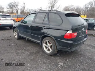 2001 BMW X5 3.0i with VIN WBAFA53501LM71185, listed as a IAAI auction lot 41610473 with 141,322 mi miles. Bid and sale history available at carsss.com. Image 3.