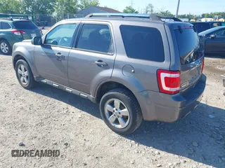 2010 Ford Escape Limited with VIN 1FMCU0EG6AKC82864, listed as a IAAI auction lot 42611537 with 103,656 mi miles and . Bid and sale history available at DreamBid. Image 3.