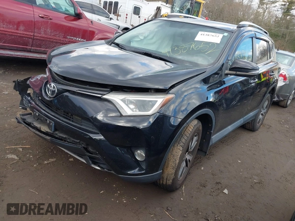 2016 Toyota RAV4 XLE with VIN 2T3RFREV4GW416606, listed as a IAAI auction lot 41387652 with 93,977 mi miles and . Bid and sale history available at DreamBid. Image 18.