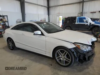 2014 Mercedes-Benz E-Class E 350 with VIN WDDKJ8JB5EF261011, listed as a Copart auction lot 47010935 with 101,688 mi miles and Salvage Title. Bid and sale history available at carsss.com. Image 4.