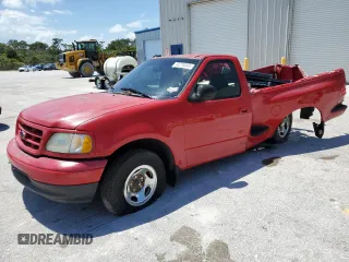 2002 Ford F-150 XL z VIN 1FTRF07202KB68581, wystawiony jako Copart lot #60276095 z przebiegiem 164 754 mil mil oraz Szkoda całkowita • Salvage title. Historia ofert i sprzedaży dostępna na DreamBid. Obrazek 1.