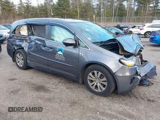 2014 Honda Odyssey EX-L with VIN 5FNRL5H67EB073640, listed as a IAAI auction lot 41115124 with 99,841 mi miles and . Bid and sale history available at carsss.com. Image 1.