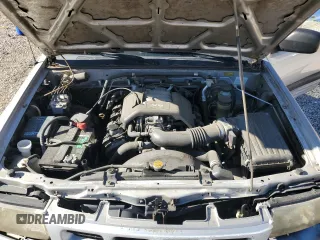 1999 Isuzu Rodeo S with VIN 4S2CK58W7X4357910, listed as a Copart auction lot 86955254 with 105,593 mi miles and Salvage Title. Bid and sale history available at DreamBid. Image 12.