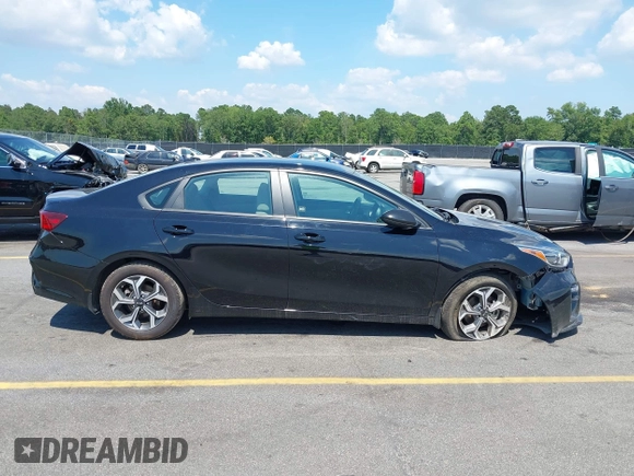 2019 Kia Forte LXS z VIN 3KPF24AD7KE102404, wystawiony jako IAAI lot #42571520 z przebiegiem 61 502 mil mil oraz . Historia ofert i sprzedaży dostępna na DreamBid. Obrazek 13.