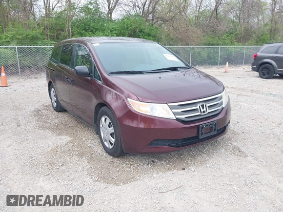 2013 Honda Odyssey LX with VIN 5FNRL5H25DB080209, listed as a IAAI auction lot 42123644 with 157,631 mi miles and . Bid and sale history available at carsss.com. Image 1.