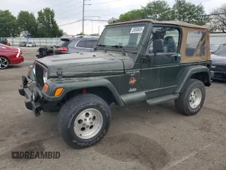 1998 Jeep Wrangler Sahara z VIN 1J4FY49S2WP707318, wystawiony jako Copart lot #59508635 z przebiegiem 144 948 mil mil oraz Czysty tytuł • Clean title. Historia ofert i sprzedaży dostępna na DreamBid. Obrazek 1.