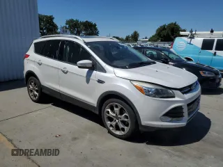 2015 Ford Escape Titanium with VIN 1FMCU0J95FUA92671, listed as a Copart auction lot 63930755 with 191,209 mi miles and Clean title. Bid and sale history available at DreamBid. Image 4.