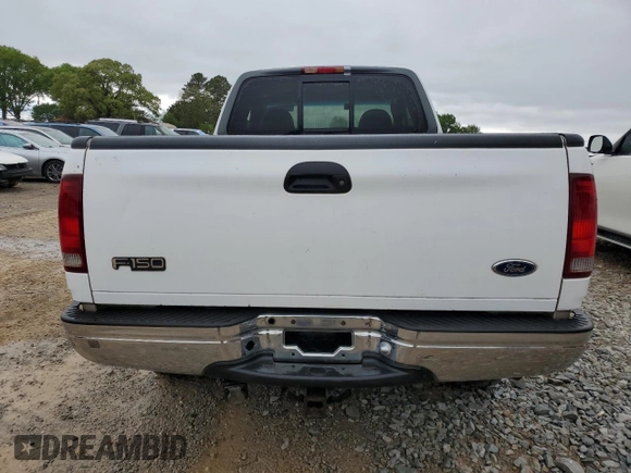1998 Ford F-150 XL with VIN 1FTRX18L7WNB60346, listed as a Copart auction lot 51526795 with 290,180 mi miles and Salvage title. Bid and sale history available at DreamBid. Image 6.