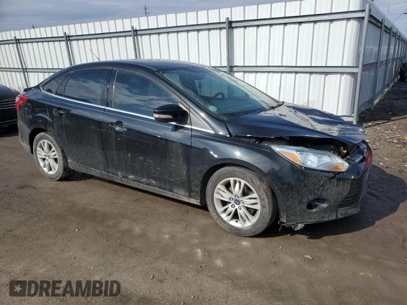 2012 Ford Focus SEL with VIN 1FAHP3H20CL329098, listed as a Copart auction lot 46990485 with 131,783 mi miles and Salvage Title. Bid and sale history available at DreamBid. Image 4.