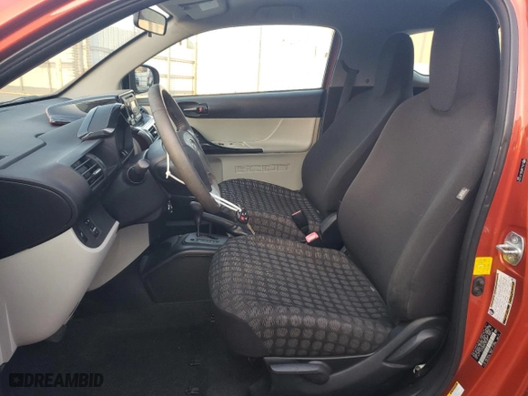 2012 Scion iQ with VIN JTNJJXB00CJ012327, listed as a Copart auction lot 87223244 with 111,223 mi miles and Salvage Title. Bid and sale history available at carsss.com. Image 7.